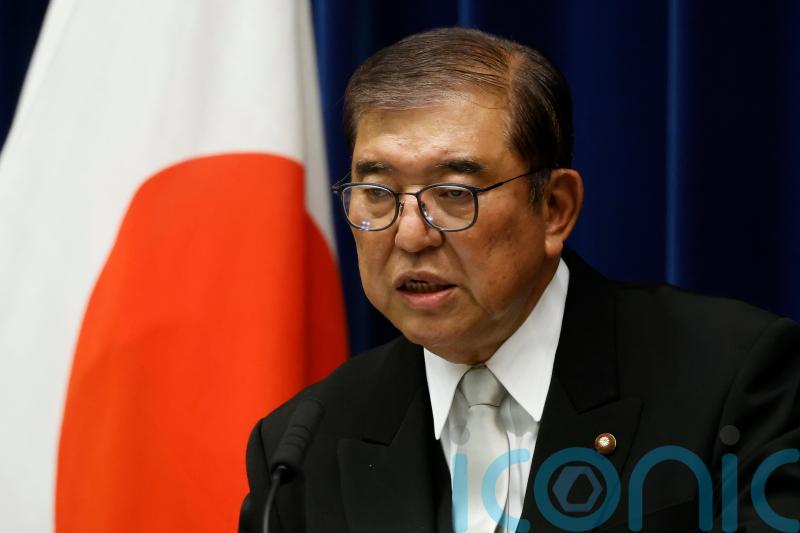 Re-elected Japanese PM vows to step up reform