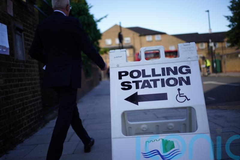 Armed forces veterans to be able to use ID card to vote, minister tells MPs