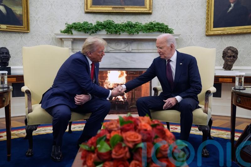 Trump returns to Washington in triumph and meets Biden at White House