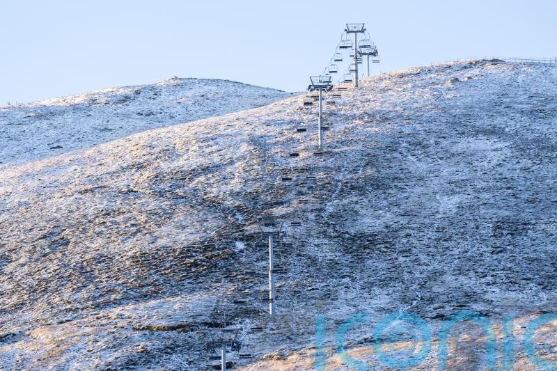 Snow falls across parts of UK after coldest night of the season