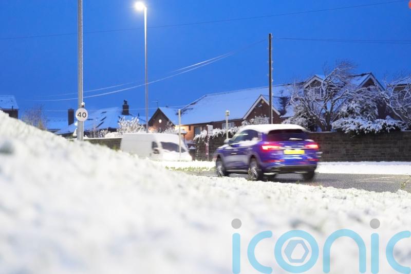 Trains cancelled and snow warnings issued as cold snap settles across the UK