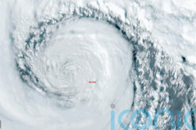 ‘Bomb cyclone’ kills two and knocks out power to more than 600,000 in US