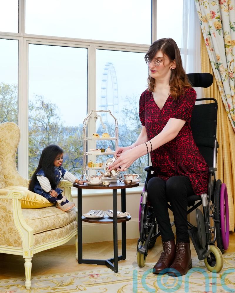 World’s tallest and shortest women meet for afternoon tea in London