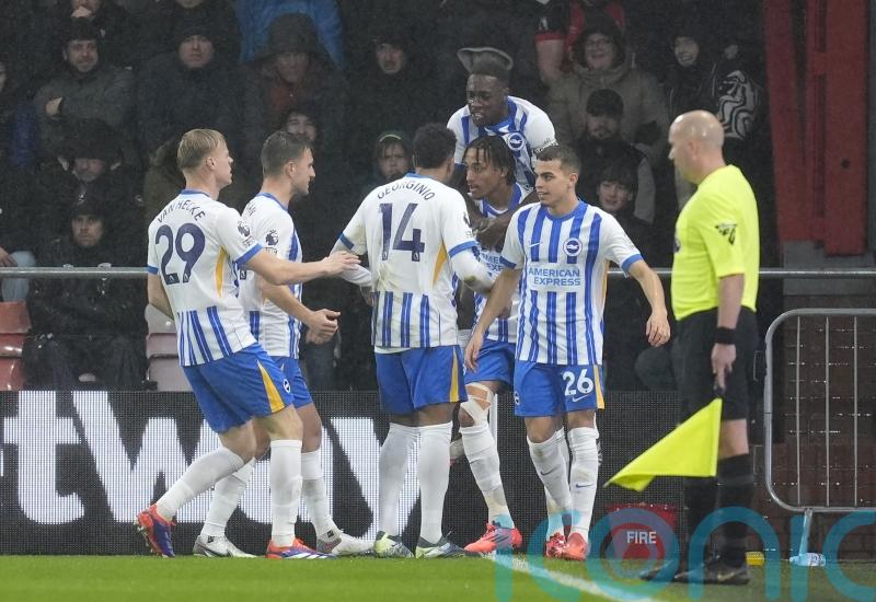 Ten-man Brighton survive anxious finish to edge out Bournemouth