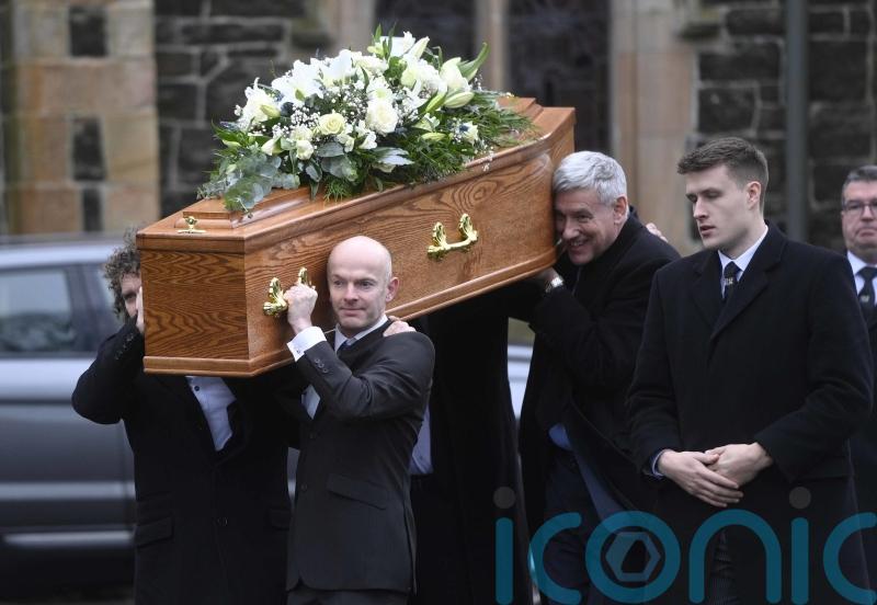 Ken Reid was loved and respected across Northern Ireland, funeral told