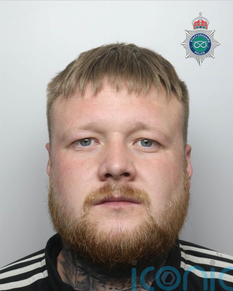 Father who threw beer cans at officers and was bitten by police dog is jailed