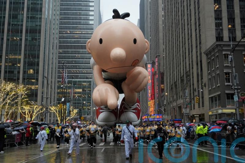 In Pictures: Big balloons, rain and protesters at Macy’s Thanksgiving Parade