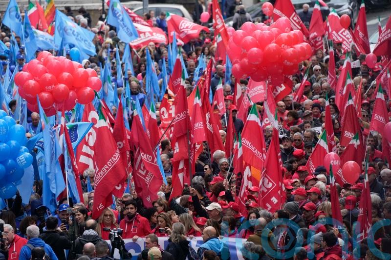 Thousands of workers stage protests across Italy in general strike