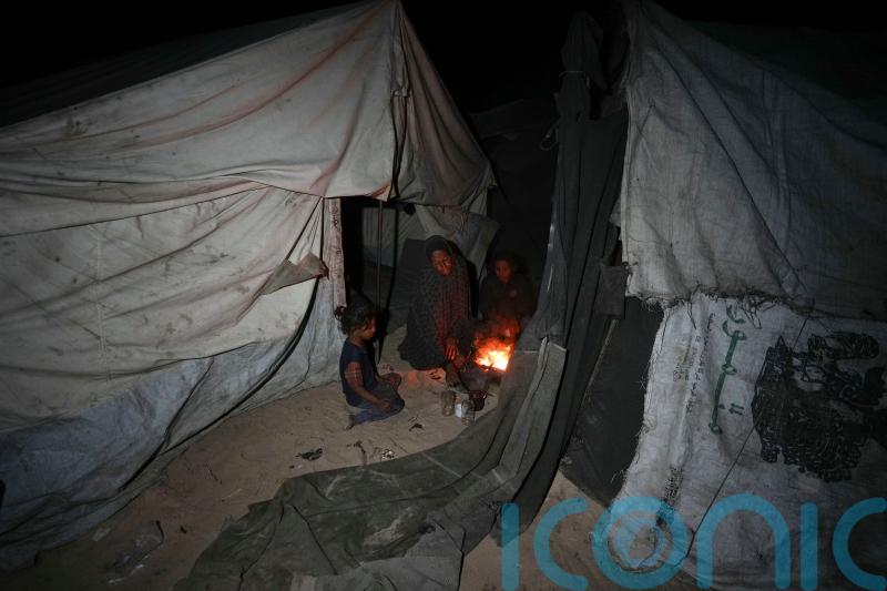 UN halts aid convoys through main Gaza crossing because of looting dangers
