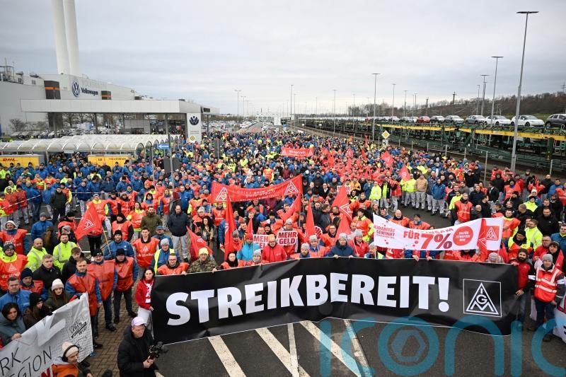 Volkswagen workers hold strikes over proposed pay cuts and factory closures