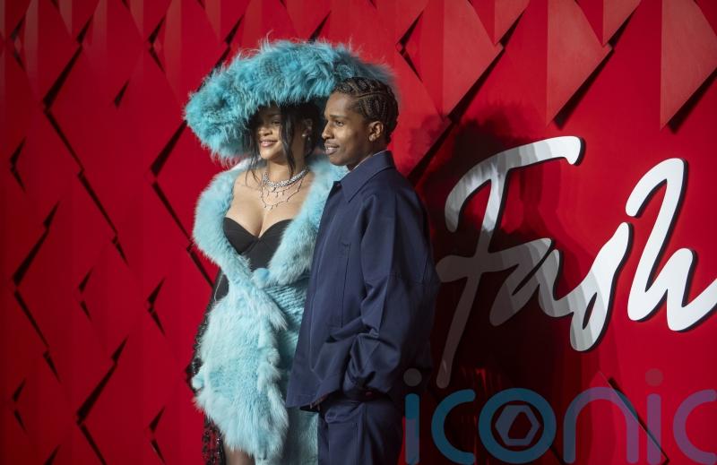 Rihanna and ASAP Rocky arrive fashionably late to London awards