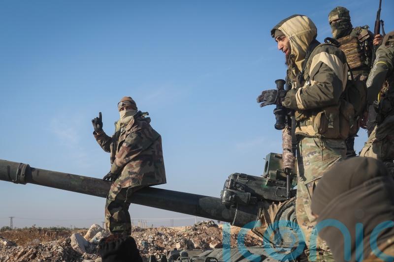 Syrian insurgents enter two central towns close to city of Homs