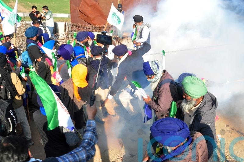 Police in India clash with farmers during protest march over crop prices