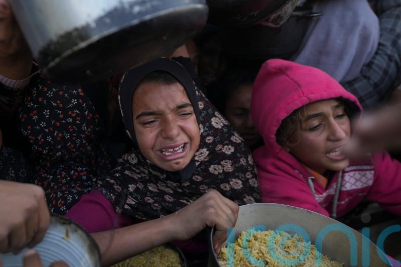 Israeli strikes continue in Gaza as neighbours close borders with Syria