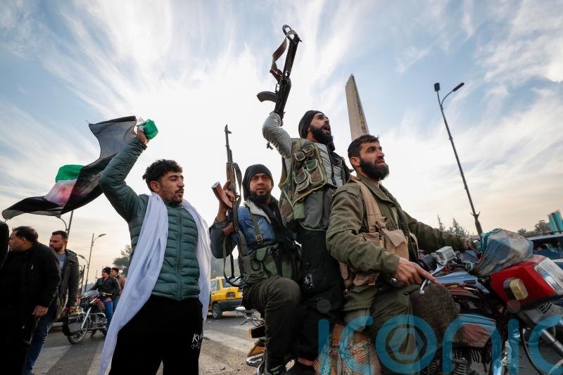 Syrian government falls to lightning rebel offensive as Assad flees