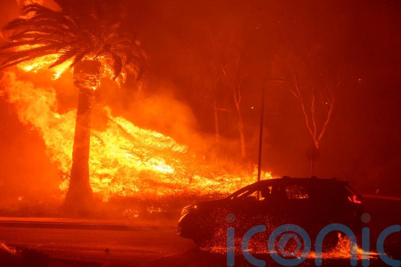 Wind-driven California wildfire sees thousands ordered to evacuate
