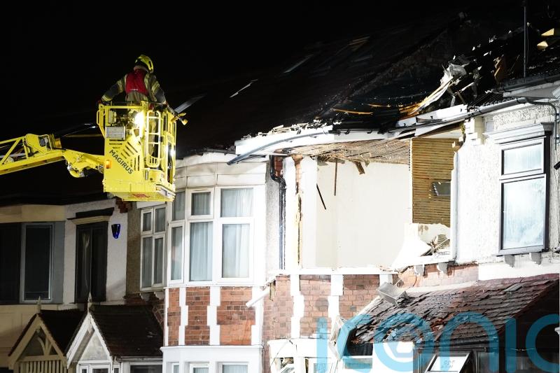 Firefighters tackle blaze at house in Ilford following explosion