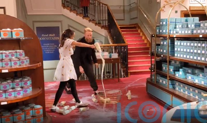 Activists given community orders for milk-pouring stunts in high-end stores
