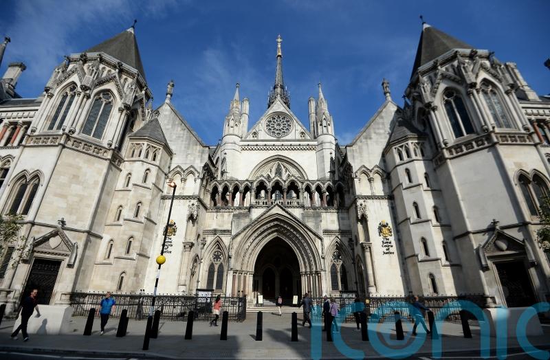 Alleged Chinese spy with links to Andrew named at High Court