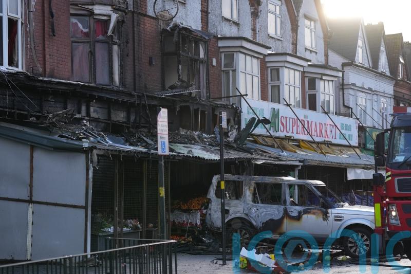 Fire at Birmingham shop hit by car sounded ‘like a bomb went off’ – residents