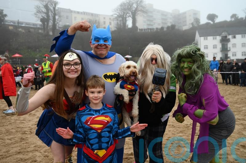 Record-breaking crowd takes the plunge at Tenby Boxing Day swim
