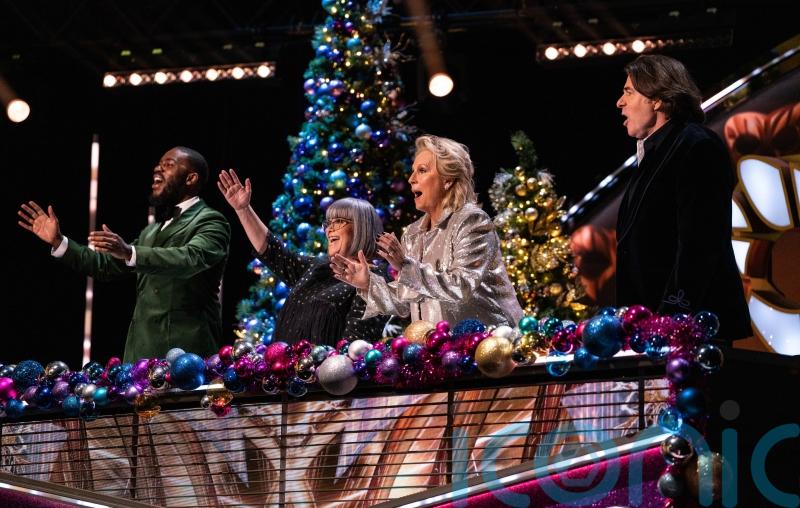 The Masked Singer judge deceives panellists with Christmas special performance