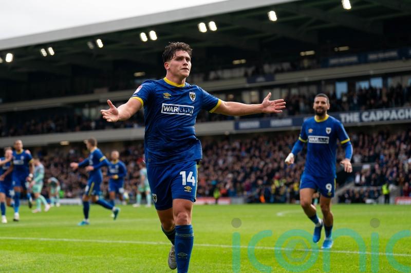 AFC Wimbledon up to second after beating Gillingham