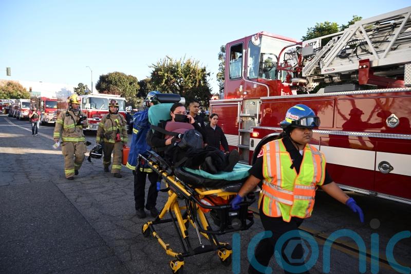 Two people killed as small plane crashes into warehouse