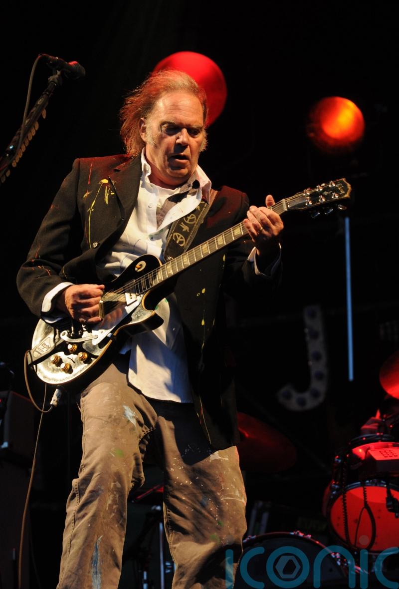 Neil Young confirmed as first Glastonbury headliner after backtracking on offer