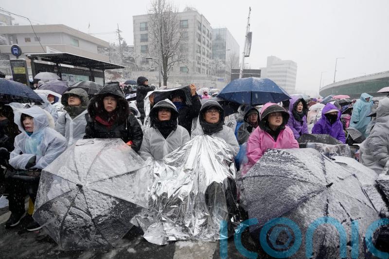 South Korean protesters brave cold to demand Yoon arrest as deadline looms