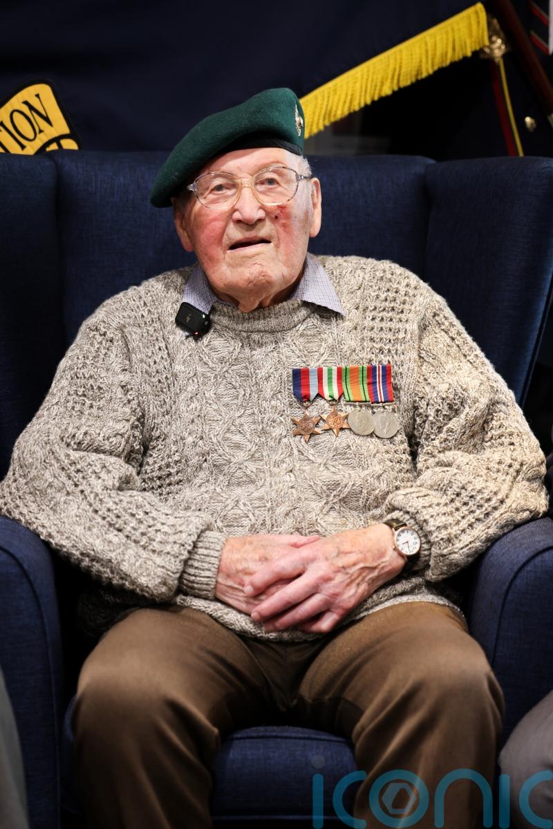 Royal Marines Band plays to help veteran celebrate 102nd birthday