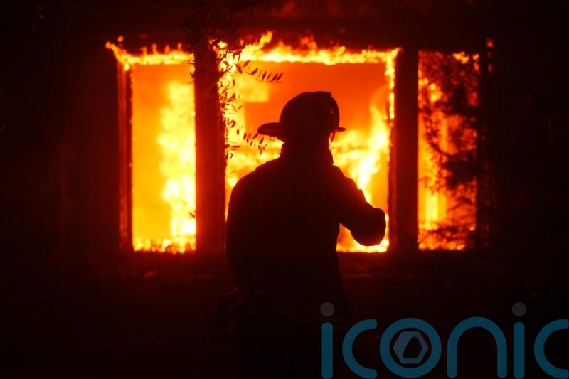 Huge wildfires kill two and destroy 1,000 structures in Los Angeles