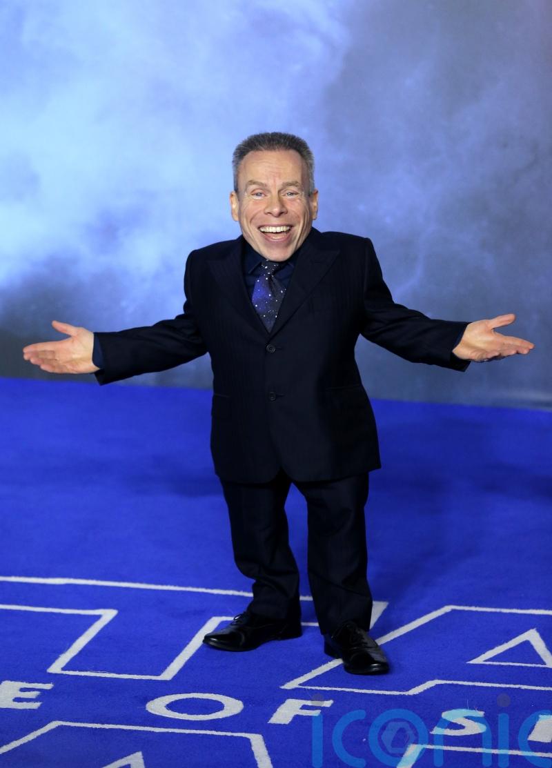 Actor Warwick Davis to receive Bafta Fellowship next month