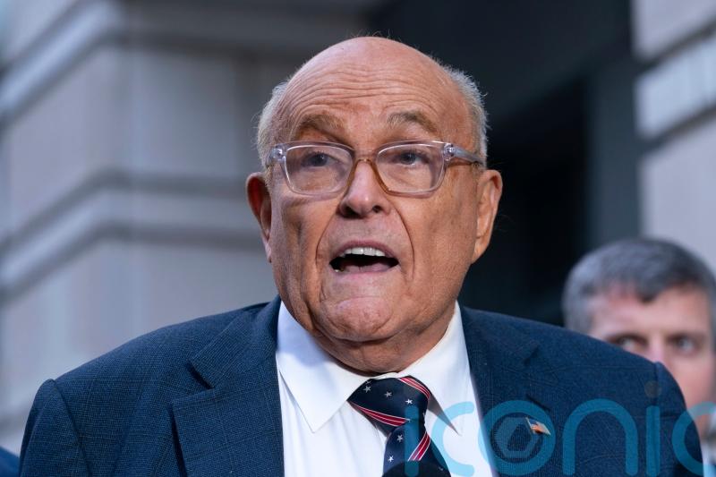 Judge holds Rudy Giuliani in contempt of court over Georgia election workers