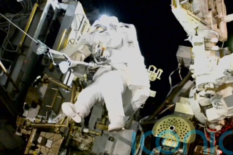 Nasa’s stuck astronaut steps out on spacewalk after seven months in orbit