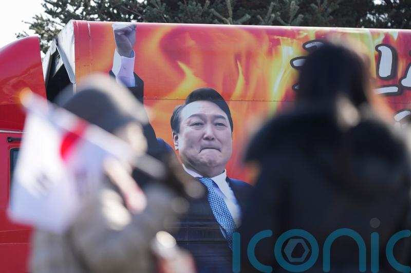 Investigators seek formal arrest for impeached South Korean President