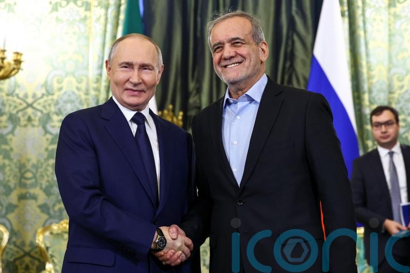 Russian and Iranian leaders sign partnership treaty in Kremlin