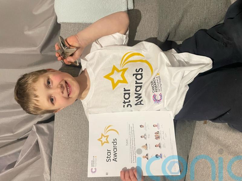 Boy, six, who lost leg and survived cancer is recognised for his bravery