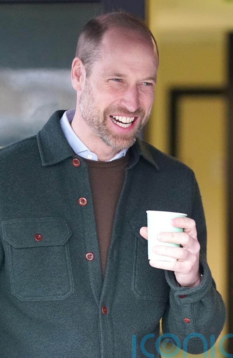 William watched by Kenny Dalglish during football match in Liverpool