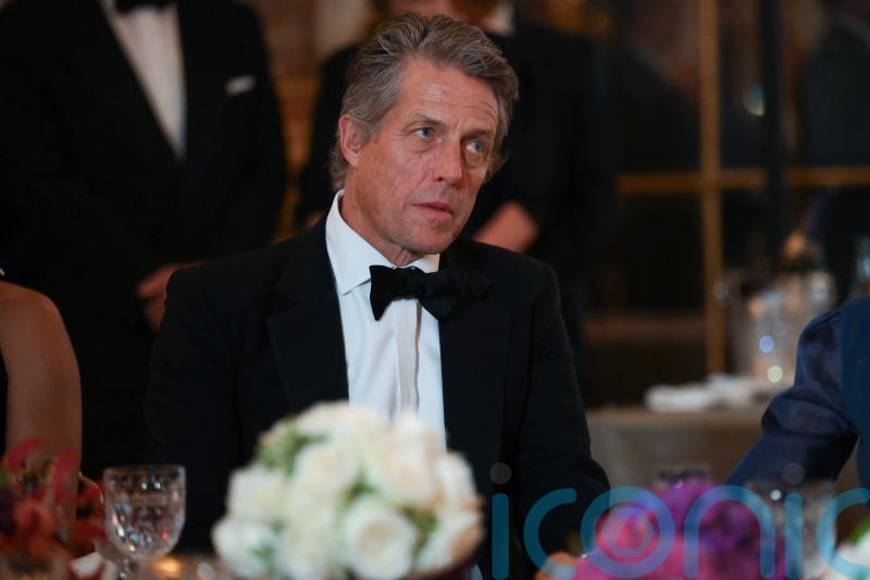 Hugh Grant calls for criminal investigation into activities of The Sun publisher