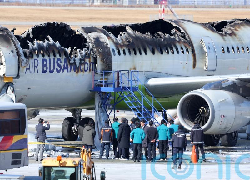 Passengers evacuated after plane catches fire at South Korean airport