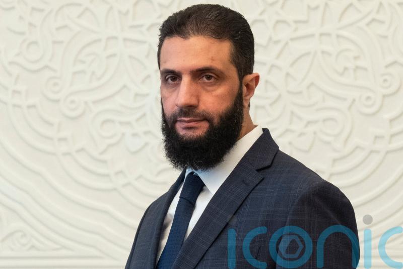 Leader of rebels who toppled Syrian president Assad named interim president