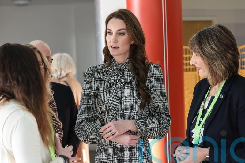 Kate chats with children as she marks patronage of Welsh hospice