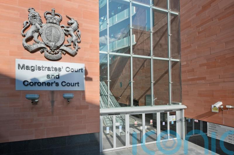 Man in court after copy of Koran burned in Manchester