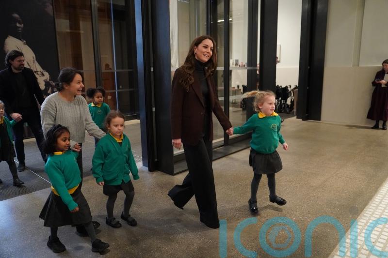 Kate joins youngsters on school bus to National Portrait Gallery for art trail