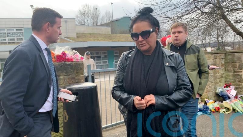 Family of boy, 15, killed in Sheffield school stabbing visit scene