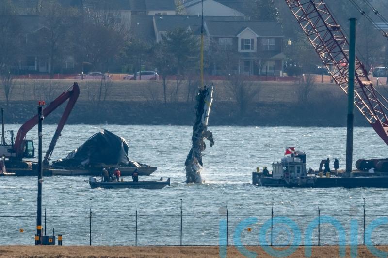 Remains of all 67 victims of US plane and helicopter crash recovered