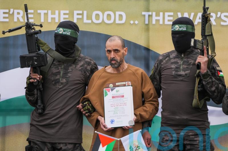 Family of freed hostage horrified at ‘grotesque spectacle’ of his release