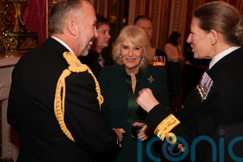 Submariners recall Queen delivering them tea and biscuits at palace reception