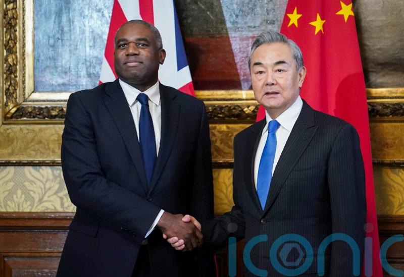 UK remains ‘robust’ with Beijing, Lammy says as he greets Chinese official
